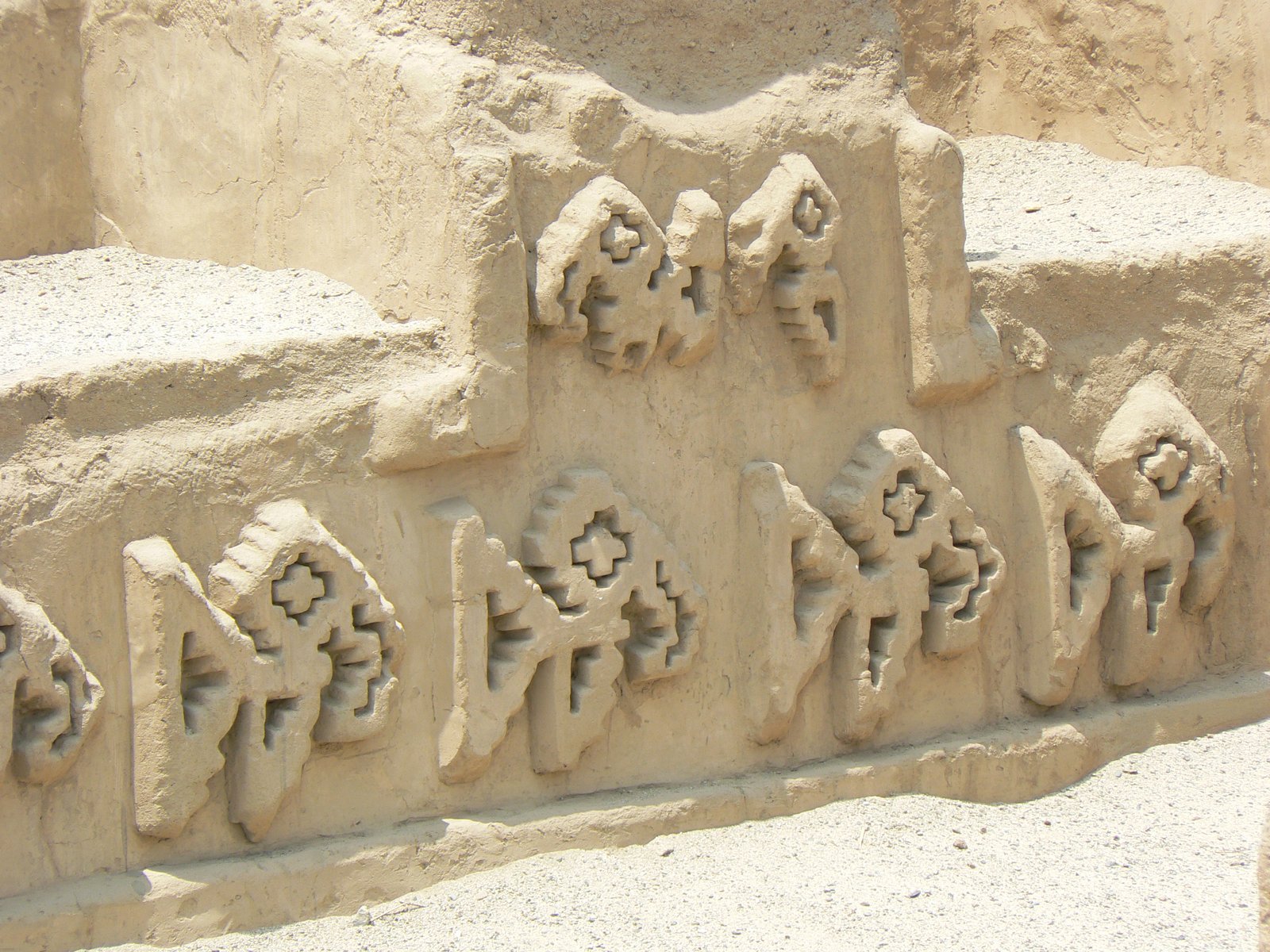Detail of adobe frieze decoration at Chan Chan